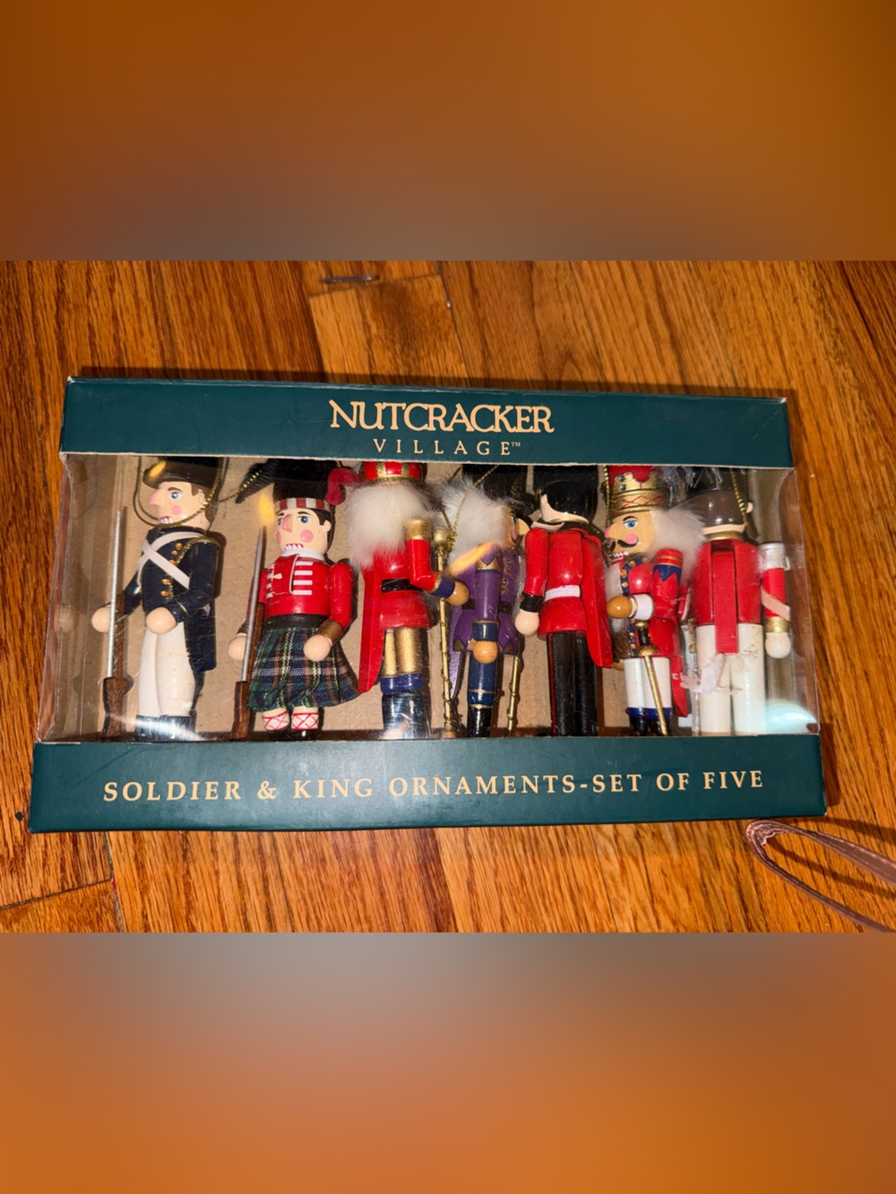vintage Nutcracker Village wooden soldier and king ornaments come in a set of 7